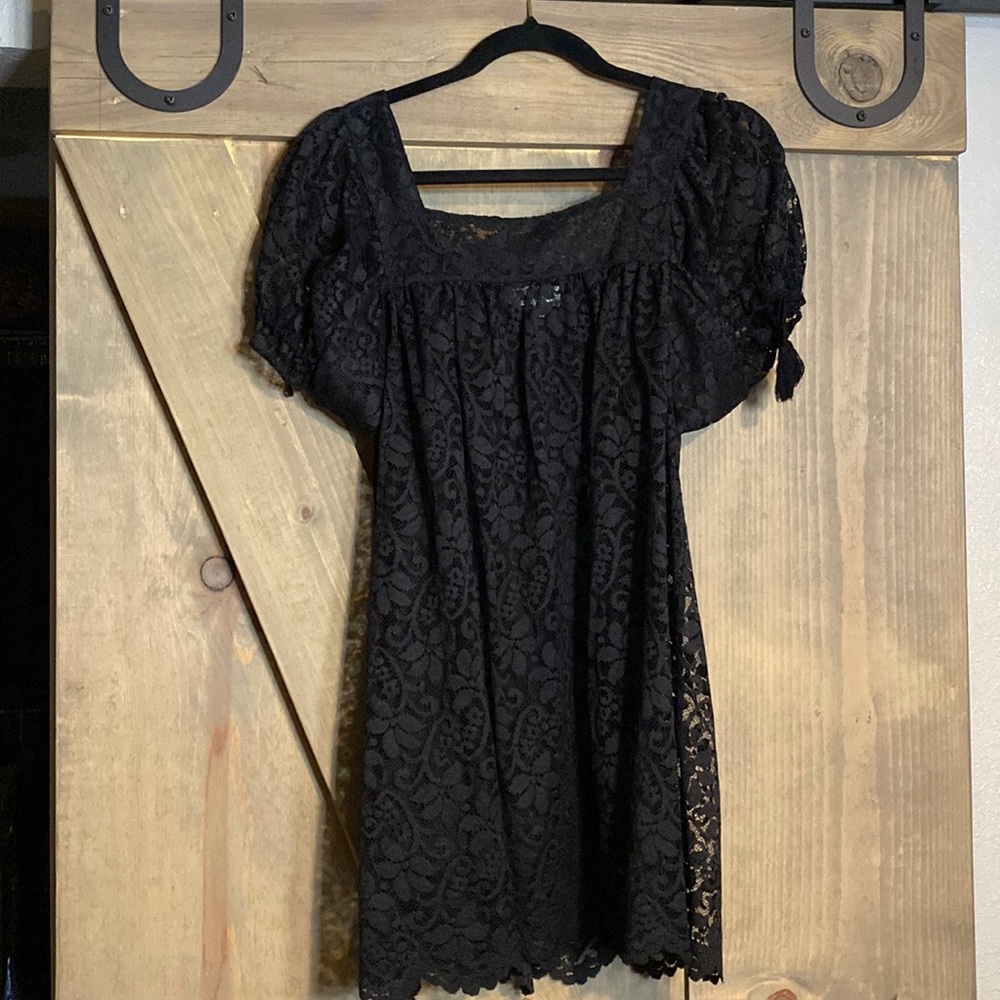 Black lace Ann Taylor loft women’s blouse. Very cute with leggings jeans etc.